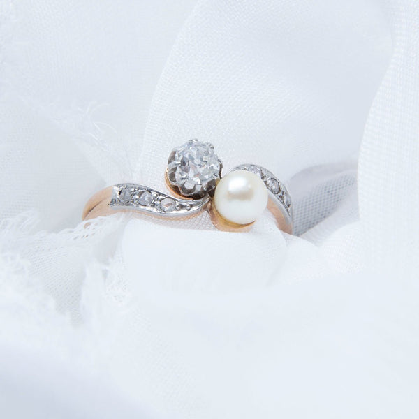 Glendry | An adorable and authentic Art Nouveau 18k rose gold and platinum Toi et Moi ring featuring a diamond and pearl