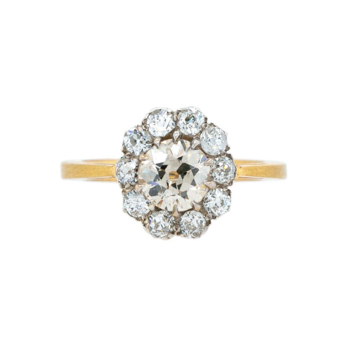 A Victorian Era 18k yellow gold and platinum cluster ring featuring a .97ct Old European Cut center. | Glenstead