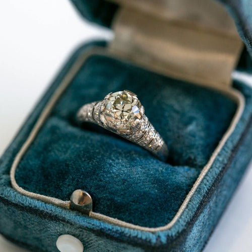 Edwardian-inspired diamond ring featuring gorgeous Old European Cut diamond center and fine engraving