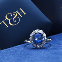 Kamari is a lovely Victorian era antique sapphire and diamond vintage engagement ring set in 18k yellow gold and platinum