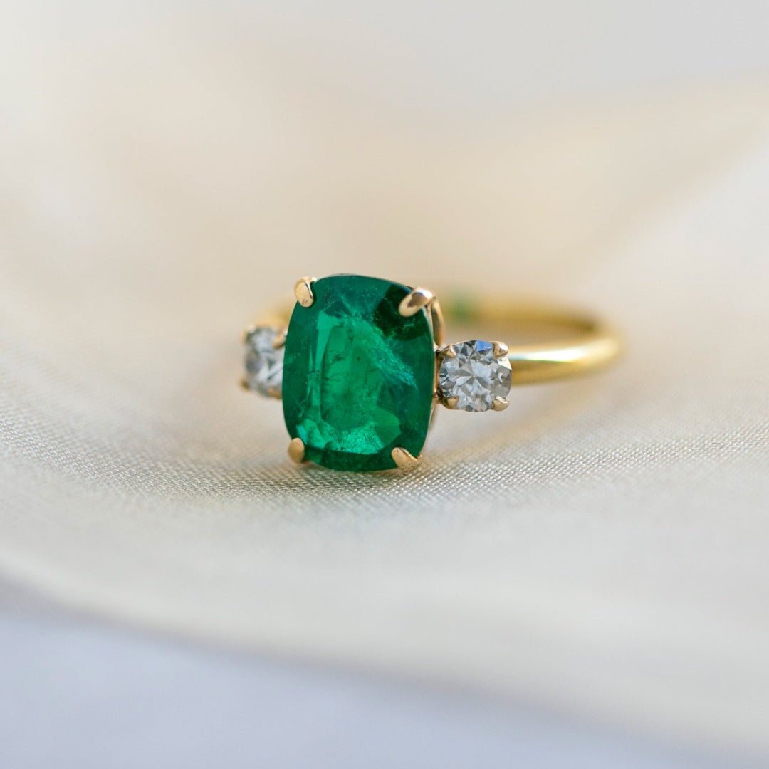 Vibrant Green Emerald & Diamond Three Stone Ring from the Mid Century Era | Livingstone