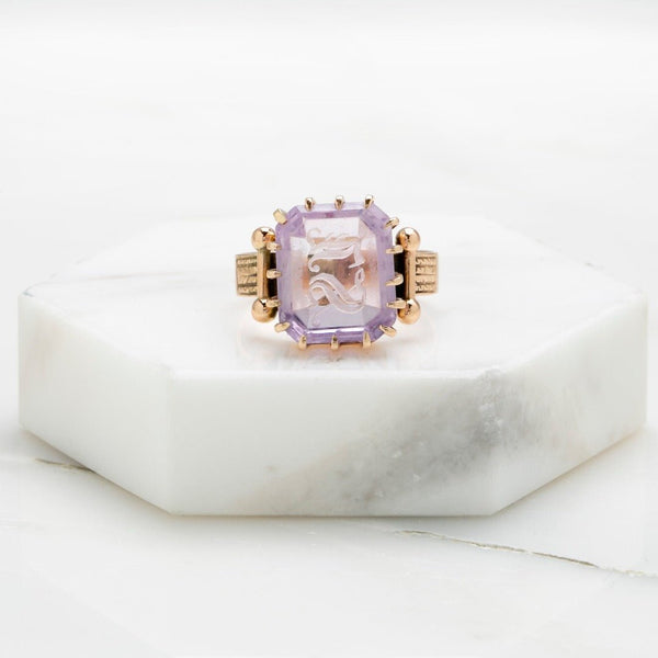 Victorian era Amethyst Intaglio Ring with the initials LS carved into the emerald cut amethyst