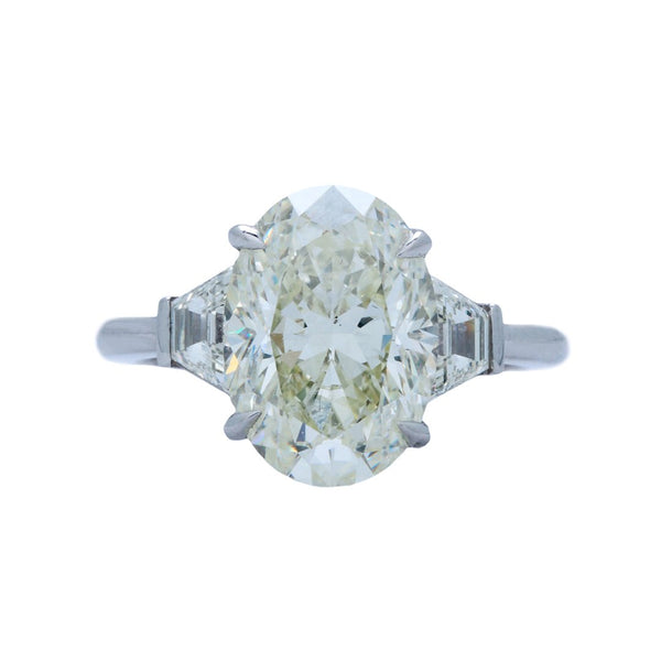 A Showstopping Platinum and Oval Cut diamond Three Stone Ring | Raymond HIll