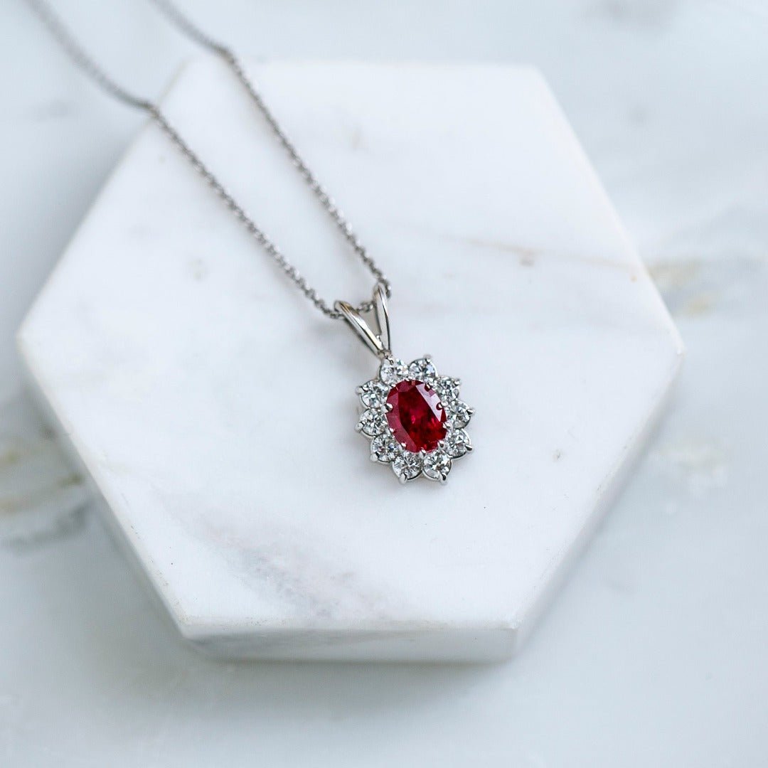 Modern Platinum 1ct Oval Ruby & Diamond Halo Pendant | T&H