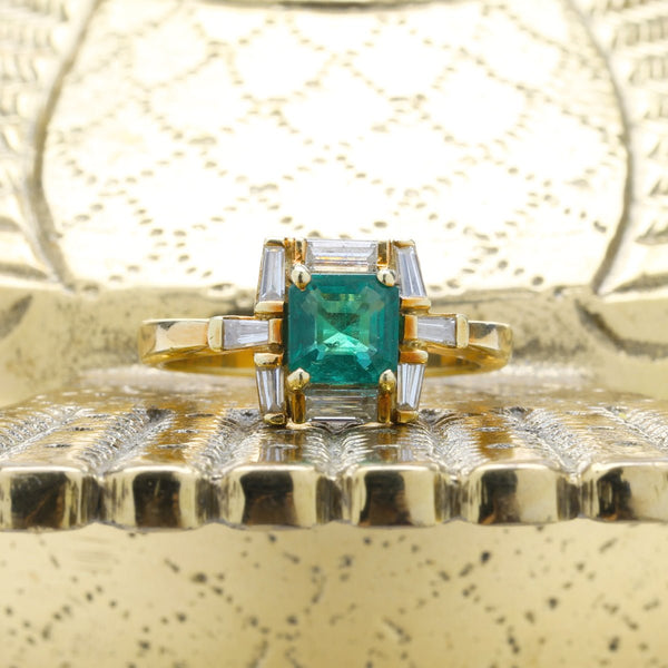 A Dramatic Emerald and Baguette Cut diamond Engagement Ring from the 1980's