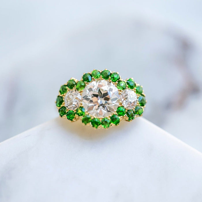 Antique Marcus & Co. 1.72ct Three-Stone Old European Cut Diamond & Demantoid Garnet Halo Ring | Triquetra