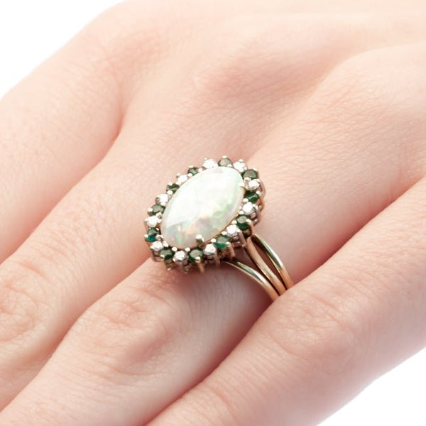 Vintage opal, emerald, and diamond cocktail ring from Trumpet & Horn