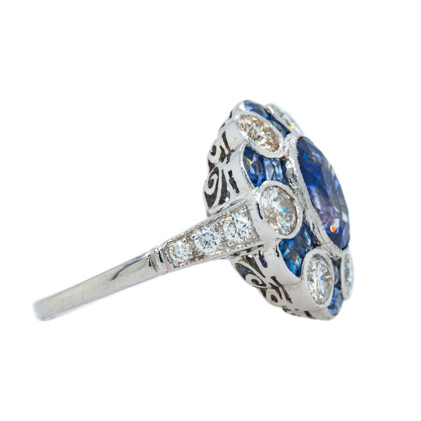 Westmead | A stunning Edwardian Inspired platinum, blue sapphire and diamond cluster ring by Trumpet & Horn