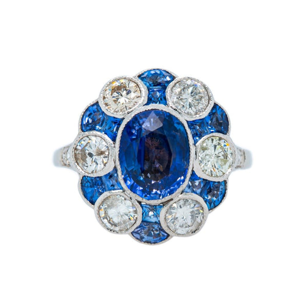 Westmead | A stunning Edwardian Inspired platinum, blue sapphire and diamond cluster ring by Trumpet & Horn